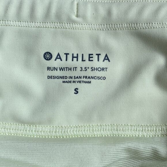 Athleta run with it short sz S pale yellow color EUC liner cinch tie pocket - Picture 5 of 6